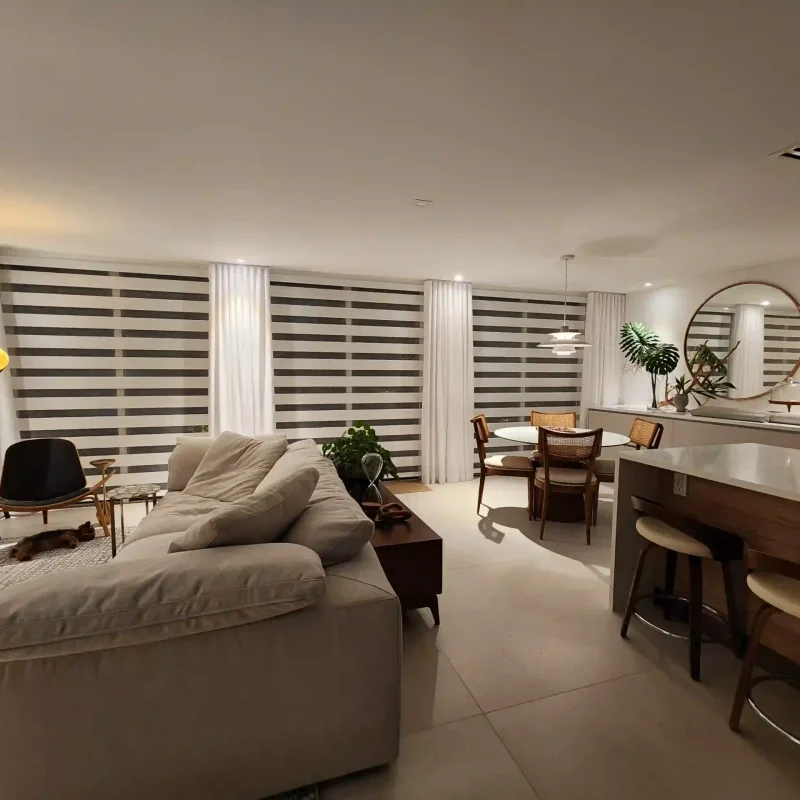 Neolux zebra window shades offer a combination of sheer and opaque stripes for controlled natural light.