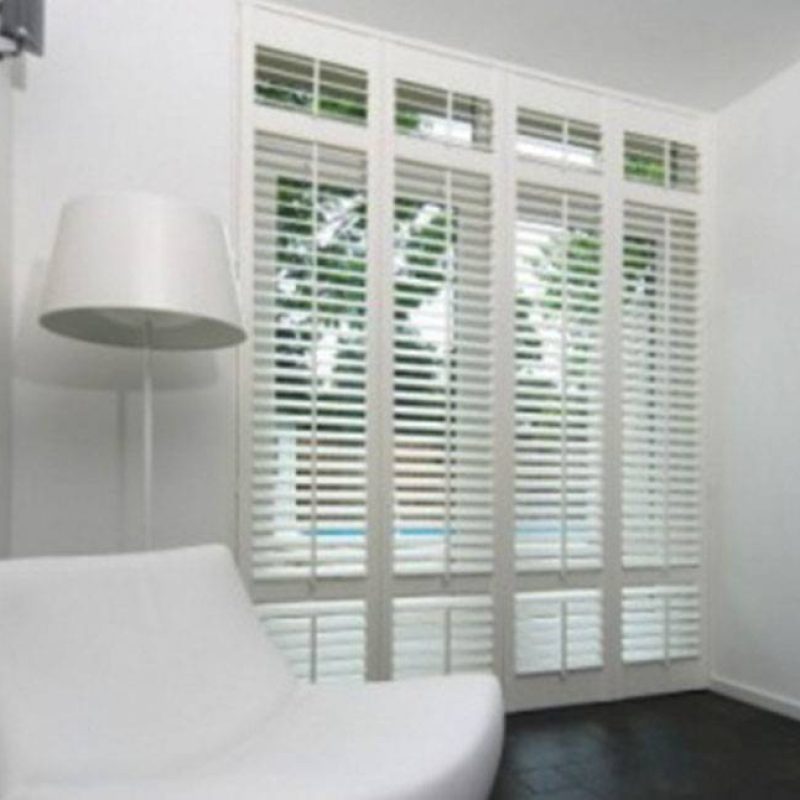 Add a touch of elegance to your home with Norman plantation shutters for windows, available in various finishes.