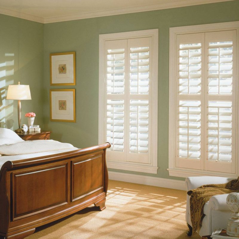 High-quality Norman plantation shutters for windows, providing style and functionality for your home.